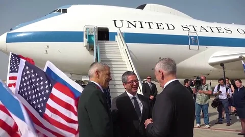 U.S. Secretary of State Jim Mattis meets Israeli officials beside Air Force One Stock Footage