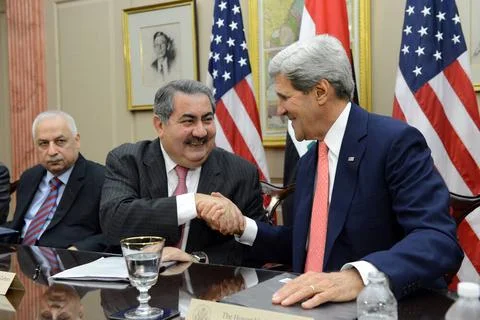 U.S. Secretary of State John Kerry and Iraqi Foreign Minister Hoshyar Zeba... Stock Photos