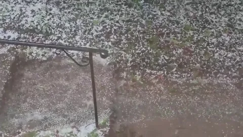 US: Severe Hail Pounds Twin Cities as Thunderstorms Roll Across Minnesota... Stock Footage 337274572