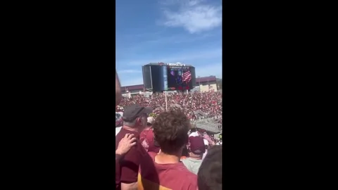 US: Skydiver crashes into scoreboard during Virginia Tech spring game in ... Stock Footage 333124996