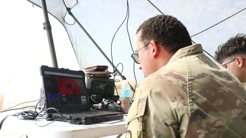U.S. Soldier operates a laptop computer to control an unmanned aerial vehicle Stock Footage 334314346