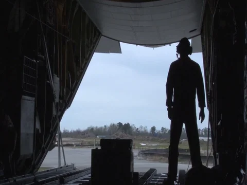 U.S. soldiers load supplies in Lockheed C-130 Hercules - 2013 Stock Footage 106155486