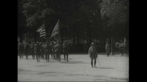 U.S. soldiers marching on parade ground and soldiers getting settle down -1918 Stock Footage 83660449