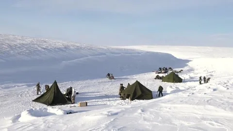 U.S. soldiers set up their base camp in the Arctic Circle for military exercise Video stock 235787900