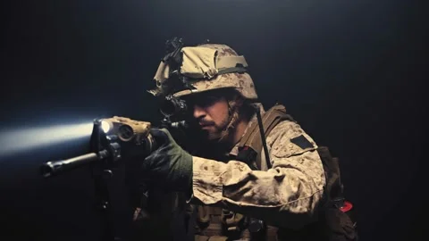 US Special forces soldier aiming with rifle at night in darkness Stock Footage 160104439