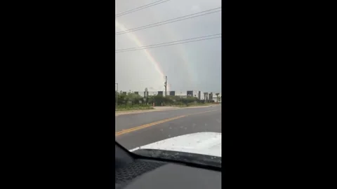 US: Spectacular Double Rainbow Lights Up Florida Sky After Rain Shower Video stock 336347467