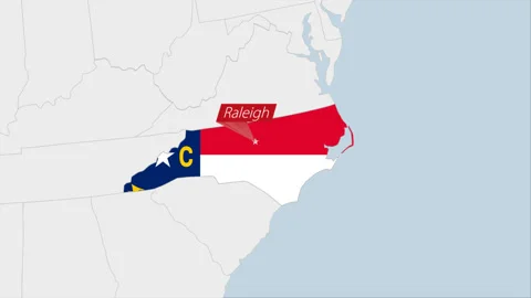 US State North Carolina map highlighted in North Carolina flag colors and pin Stock Footage 130442688
