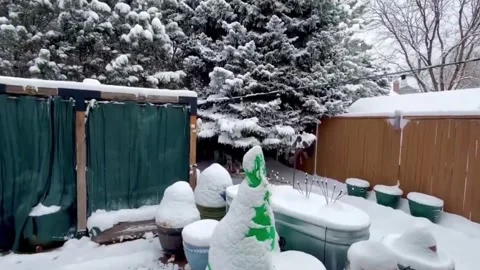 US: Sudden temperature drop brings Sunday morning snow to Centennial, Col... Stock Footage 330862642