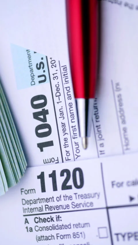 US Tax Forms and Dollar Bills. Stock Footage 339866581