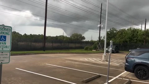 US: Tornado Forms Behind Cy Fair Fire Station In Houston Stock Footage 321832896