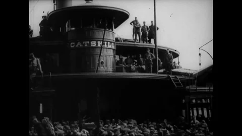 U.S. troops are debark from ship and marching with rifle at Hoboken harbor - Stock Footage 83660542