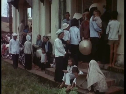 US troops help with the Revolutionary Development Program in 1960s Vietnam byƒ Stock Footage 75274779