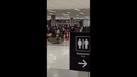 US: TSA Staffing Shortage Causes Hours-Long Security Lines at Houston Air... Stock Footage 331485117