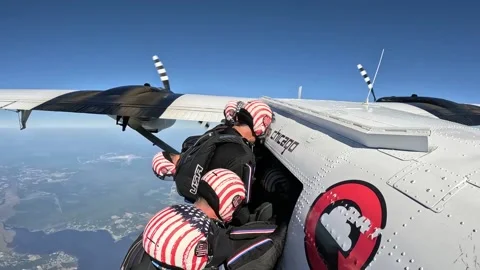 US: U.S. Army Parachute Team Soars to Victory at World Skydiving Championshi... Stock Footage 288043077