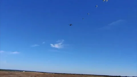 US: U.S. Army Paratroopers Launch Dramatic Airborne Operation At Fort Bra... Stock Footage 328766620