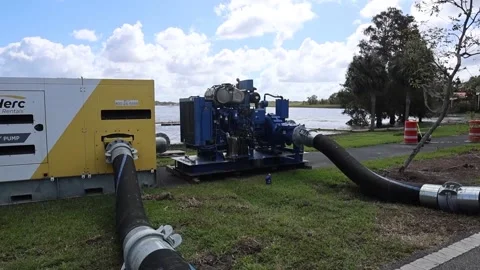 US: USACE Provides Water Pumps to Bring Flood Relief to Lake Bonny Reside... Stock Footage 291289038