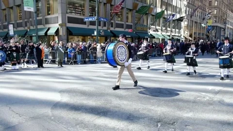 US: Xaverian High School Pipe Band in the St Patrick's Day Parade Stock Footage 330988984
