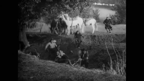 USA - 1912 - In this silent western, Native American scouts open fire on the Stock Footage 288083445