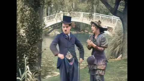 USA - 1914 - In this silent comedy, a man (Charlie Chaplin) goes to a bar after Stock Footage 296388155