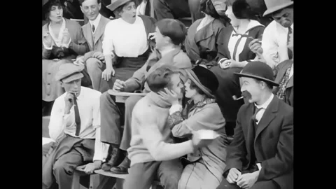 USA - 1914 - In this silent comedy, a man (Charlie Chaplin) kidnaps a romantic Stock Footage 301528352