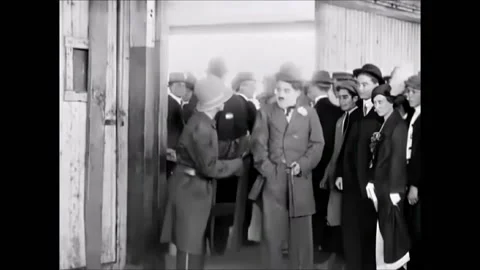 USA - 1914 - In this silent comedy, a man (Charlie Chaplin) gets into a fight Stock Footage 301529437