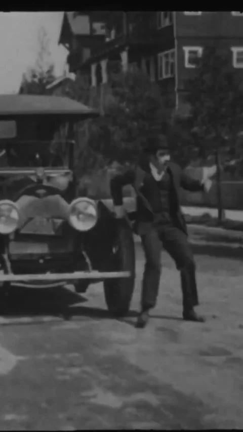 USA - 1915 - In this silent comedy, a man sees the silhouette of a tailor Stock Footage 342619673