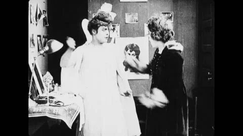 USA - 1916 - In this silent comedy, janitors attack actors so they can take Stock Footage 284814290