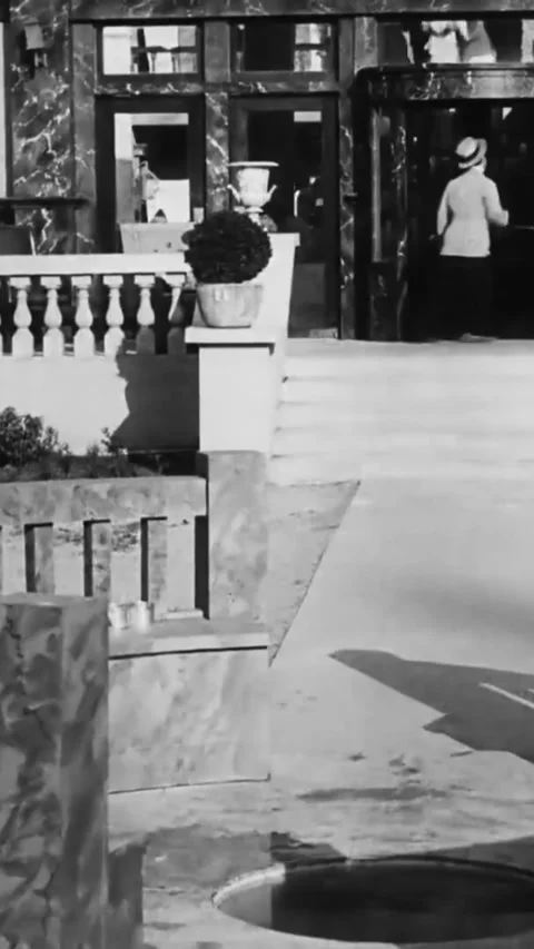 USA - 1917 - In this silent comedy, a drunk man (Charlie Chaplin) is made dizzy Stock Footage 339124996