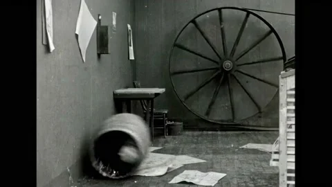 USA - 1917 - In this silent comedy, a man stuck in a barrel of printer's ink Stock Footage 330604437
