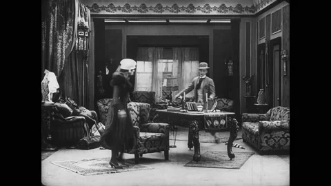 USA - 1917 - In this silent comedy, a scheming man convinces a woman to help him Video stock 323084976