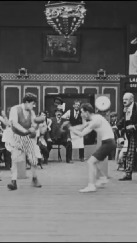 USA - 1919 - in this silent comedy, in a boxing match, one man wins by cheating. Stock Footage 342993152
