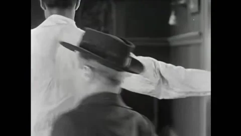 USA - 1920 - In this silent comedy, a man stumbles into a woman's hotel room and Stock Footage 327744183