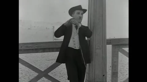 USA - 1920 - In this silent comedy, a man tries to sneakily buy alcohol on the Stock Footage 327745102