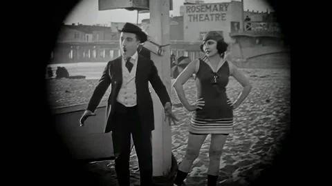 USA - 1920 - In this silent comedy, a man desperate for liquor follows a woman Stock Footage 327751506