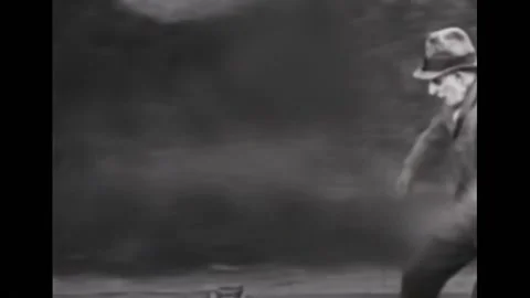 USA - 1920 - In this silent comedy, a moonshiner ends up on a tandem bicycle Stock Footage 313213413