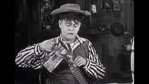 USA - 1920 - In this silent comedy, a moonshiner's product makes him breath Stock Footage 313214122