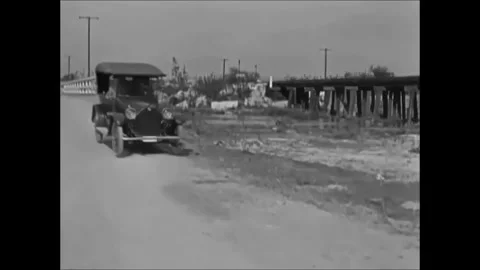 USA - 1920 - In this silent drama, train conductors catch up to and fight Stock Footage 340583227
