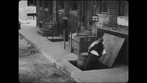 USA - 1921 - In this silent comedy, a baker tries to lure an annoying employee Stock Footage 325210593