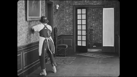 USA - 1921 - In this silent comedy, a man accidentally ends up in a showering Stock Footage 325207413