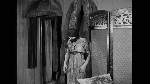 USA - 1921 - In this silent comedy, a sailor dresses in drag to fool a sultan. Stock-Footage 337973410