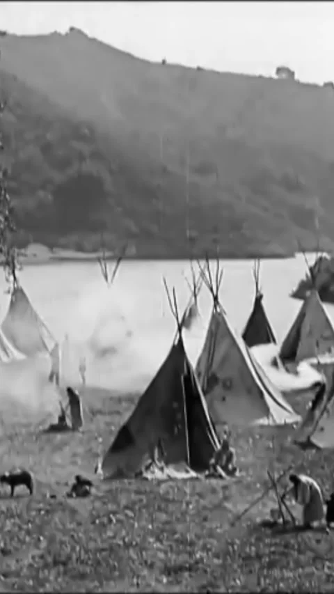 USA - 1922 - In this silent western, a Native American chief smokes a peace pipe Stock Footage 342862866