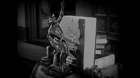 USA - 1925 - In this drama, two men are in a large fancy house. A man throws a Stock Footage 325212834