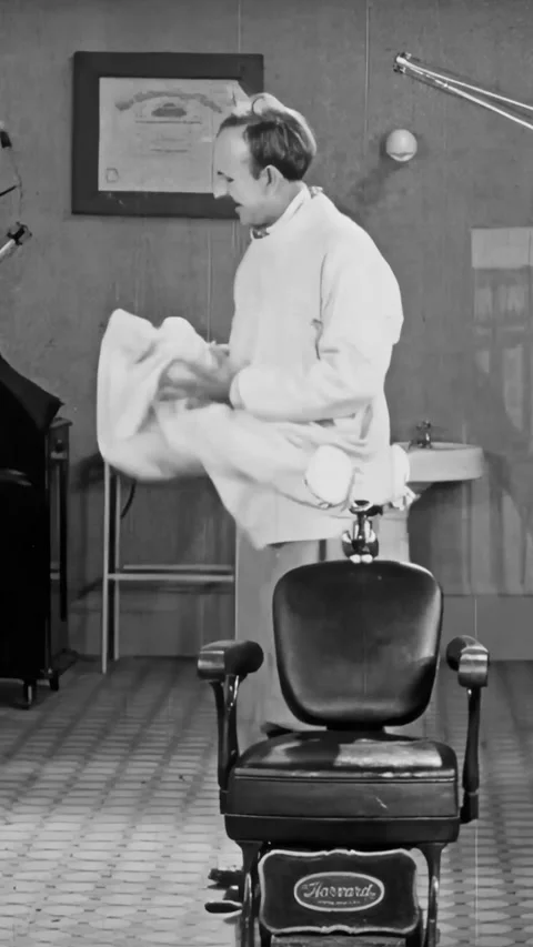 USA - 1925 - In this silent comedy, a dentist accidentally gives a patient so Stock Footage 339804783
