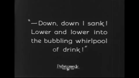 USA - 1925 - In this silent comedy, a drunk man is poured a drink and then bends Stock Footage 340656460