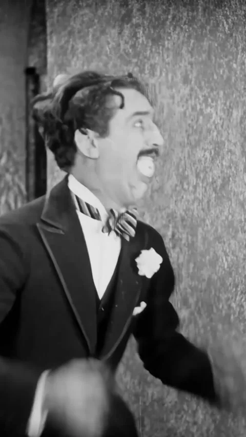 USA - 1925 - In this silent comedy, a man tries to help knock a billiard ball Stock Footage 339806149