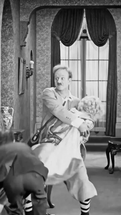 USA - 1925 - In this silent comedy, two men hide an unconscious woman in her Stock Footage 339806121