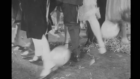 USA - 1927 - In this silent comedy, a clock falls onto a drunk partygoer at a Stock Footage 330604038