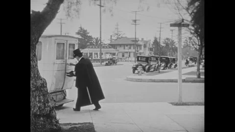USA - 1927 - In this silent comedy, a drunk man climbs into an ambulance to Stock Footage 341327527