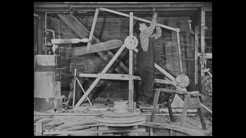 USA - 1927 - In this silent comedy, an inventor working in his basement Stock Footage 340666776