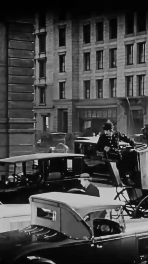 USA - 1927 - In this silent comedy, a man on the street is arguing with someone Stock Footage 342677995